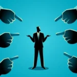 1. Businessman in a suit surrounded by multiple hands pointing at him, illustrating scrutiny or attention in a corporate setting. 2. A businessman stands in the center, with several hands pointing at him, symbolizing focus or criticism in a professional context. 3. A businessman is encircled by hands pointing towards him, representing evaluation or pressure in a business environment.